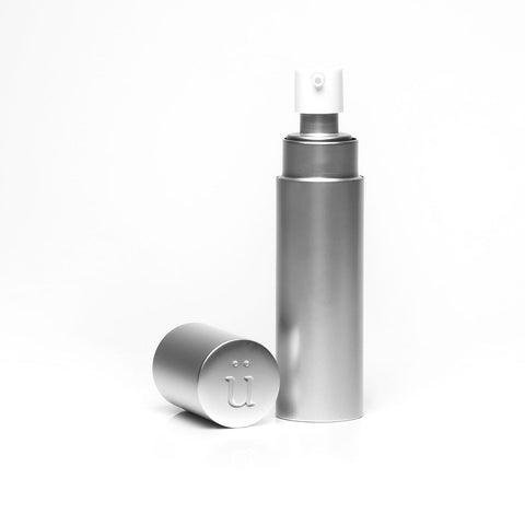 Überlube Good-to-Go silver travel case with cap removed, showing the pump